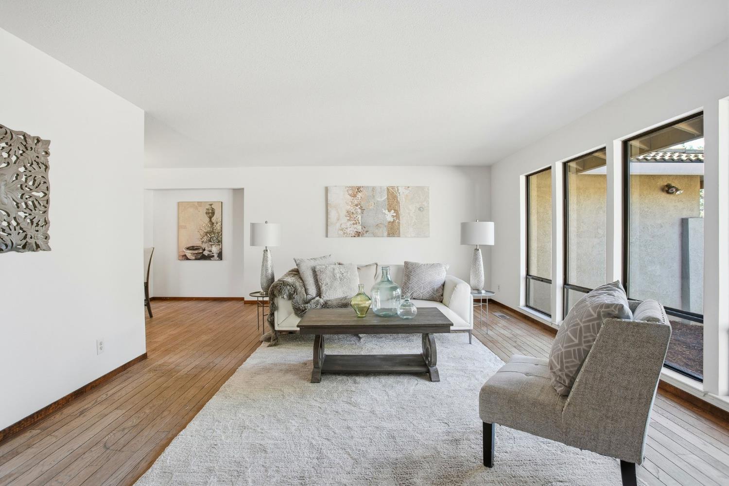 6923 Pera Drive Rancho Murieta, CA 95683 - Photo 7 of 35 a living room with furniture and wooden floor