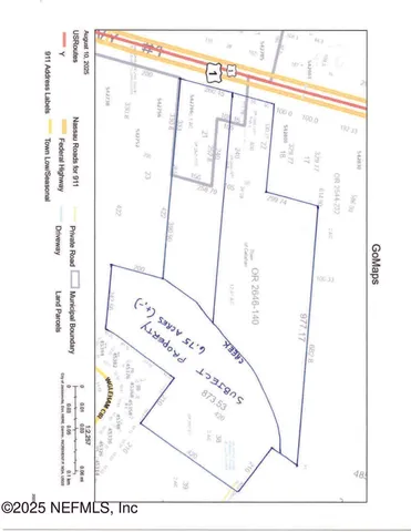 a picture of a bathroom with a shower and a mirror