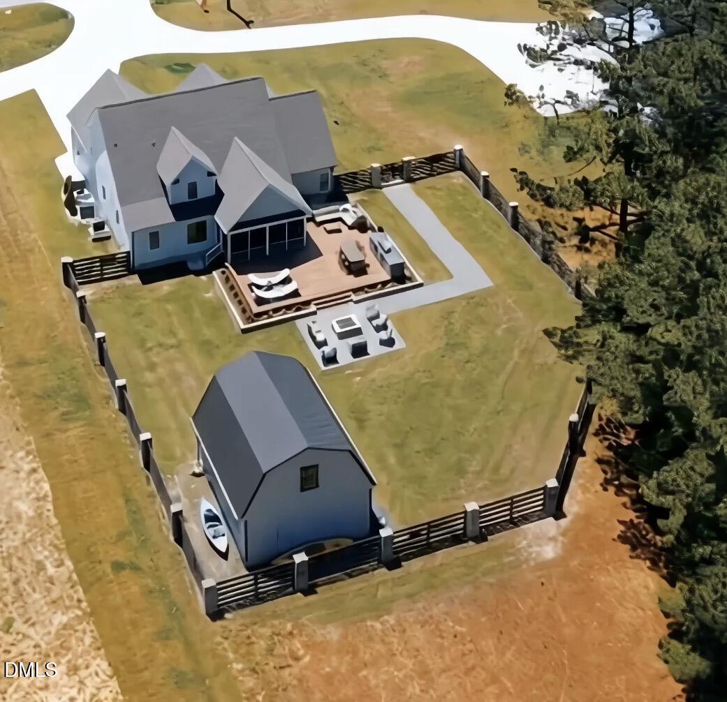 2568 Lassiter Road Four Oaks, NC 27524 - Photo 47 of 50 an aerial view of a pool