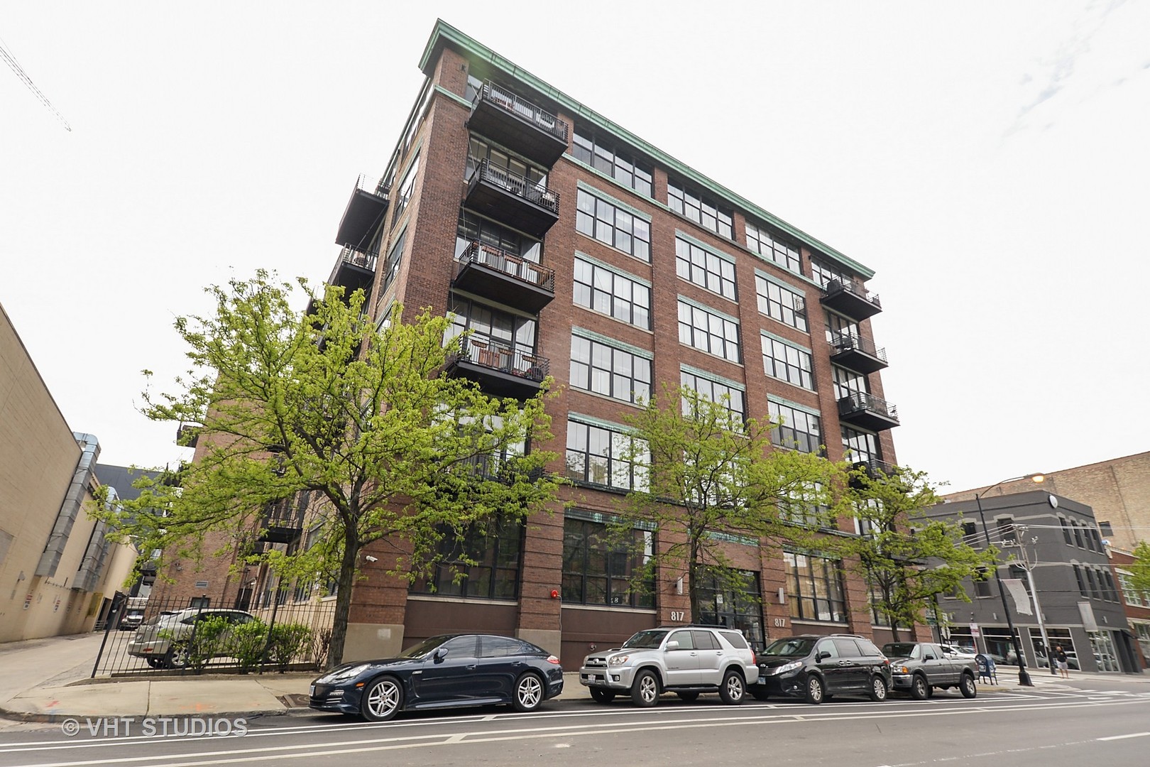 817 West Washington Boulevard, Unit 103 Chicago, IL 60607 - Photo 1 of 10 a view of a parked cars in front of a building