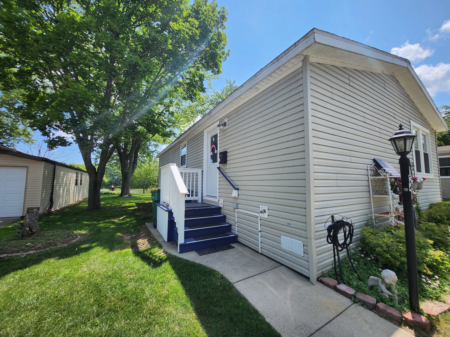 1241 Country Club Road Elgin, IL 60123 - Photo 4 of 12 a view of a house with a yard