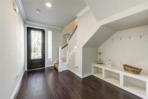 a view of entryway with wooden floor