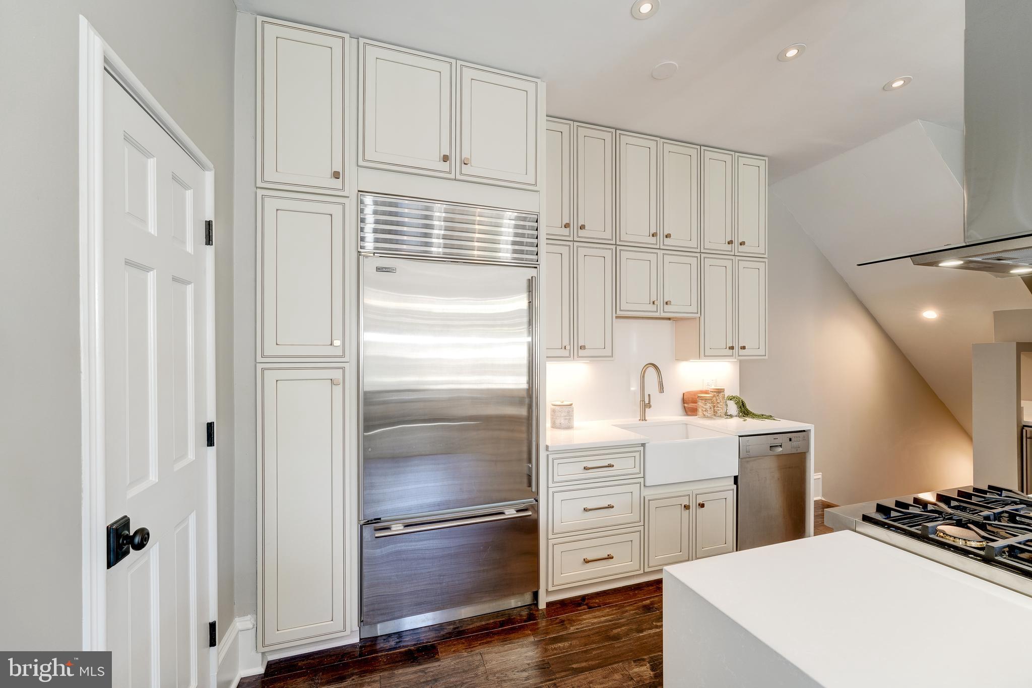 1302 R Street Northwest, Unit 1 Washington, DC 20009 - Photo 14 of 45 Under cabinet lighting surrounds farmer's sink!