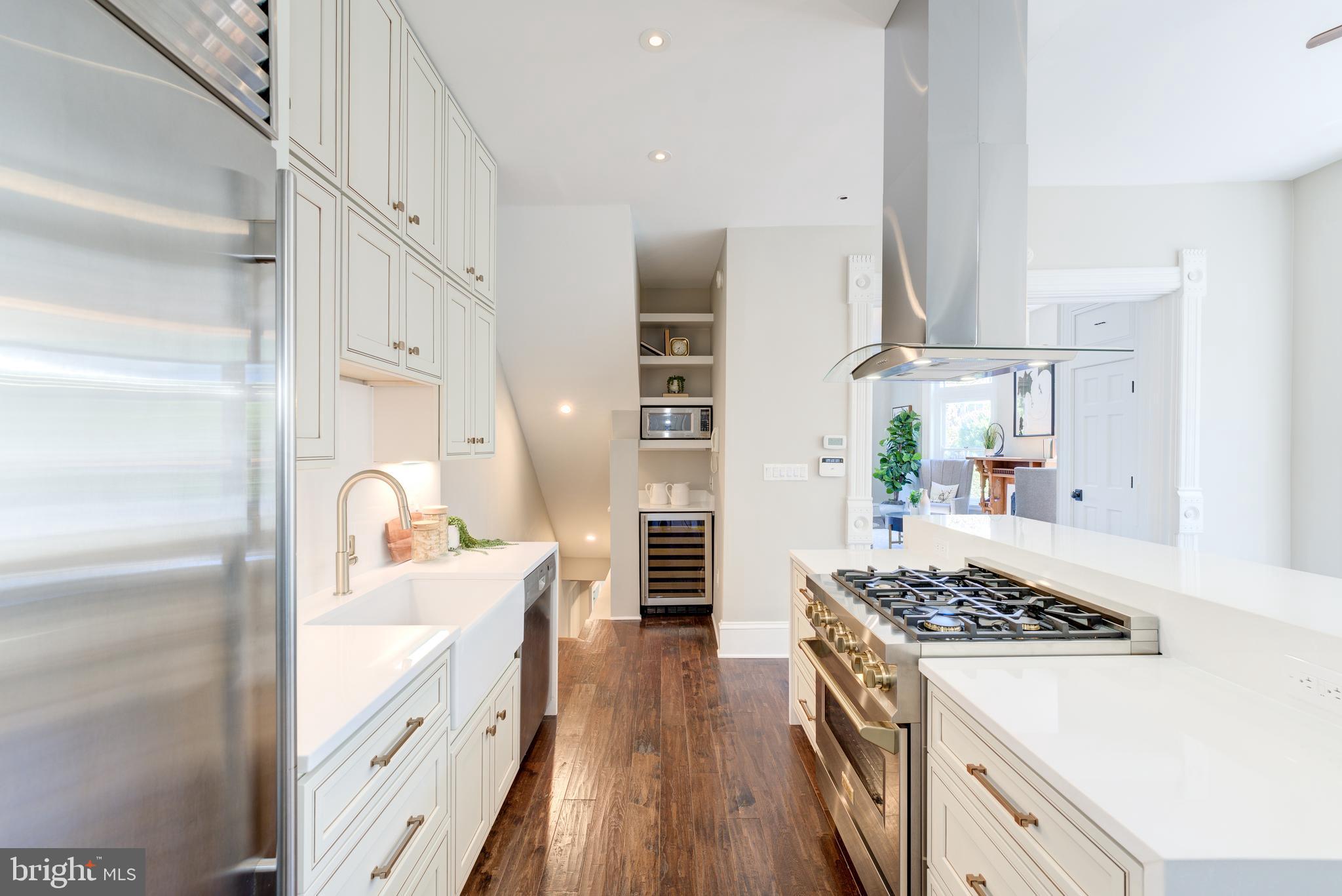 1302 R Street Northwest, Unit 1 Washington, DC 20009 - Photo 16 of 45 Quartz counters provide ample prep space!