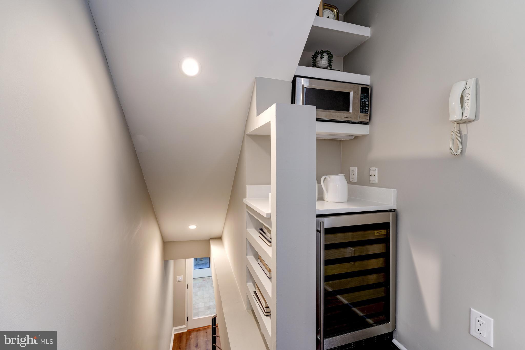 1302 R Street Northwest, Unit 1 Washington, DC 20009 - Photo 17 of 45 Built-in shelving on side of wine refrigerator!