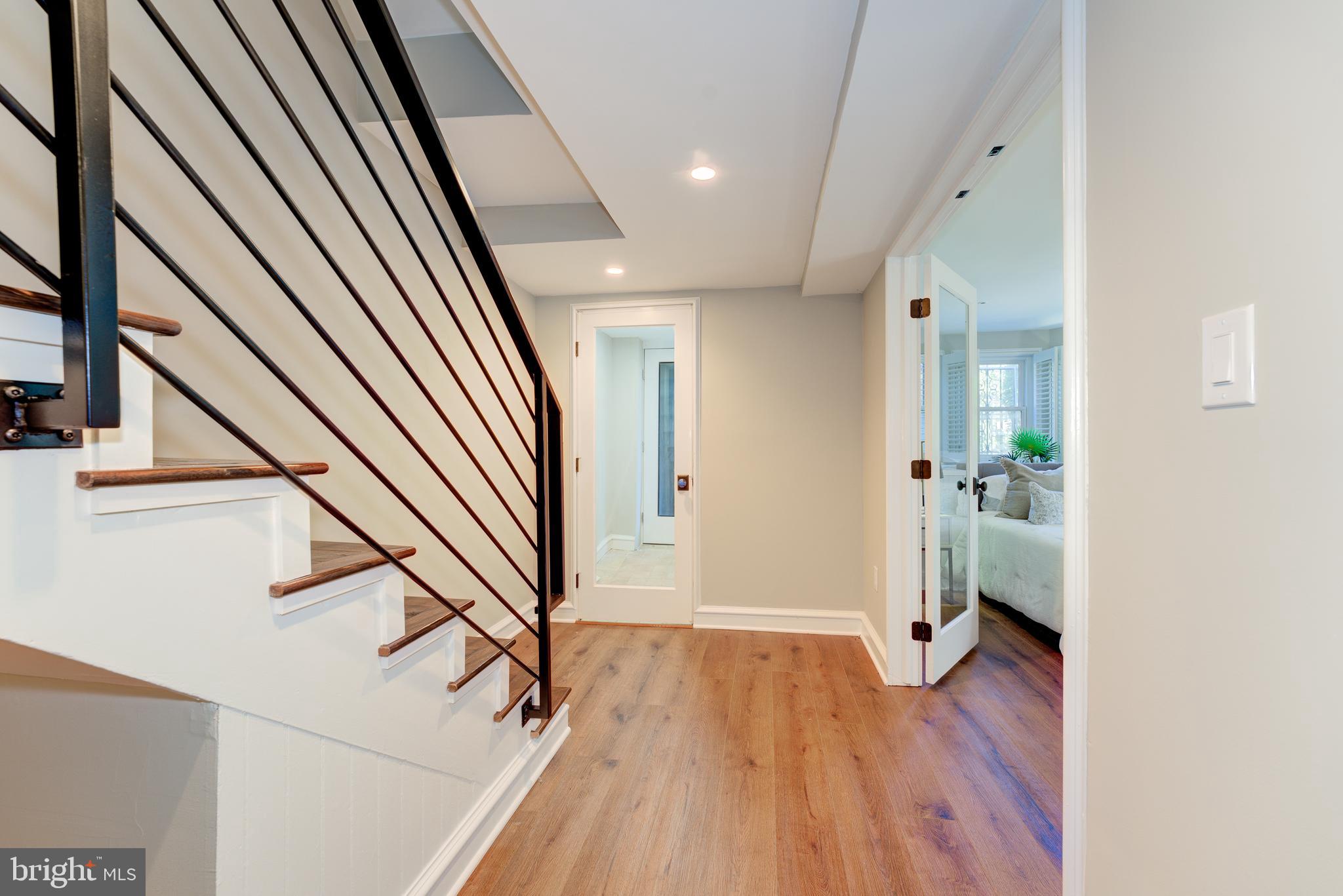 1302 R Street Northwest, Unit 1 Washington, DC 20009 - Photo 18 of 45 Custom wrought-iron staircase has its own entry.