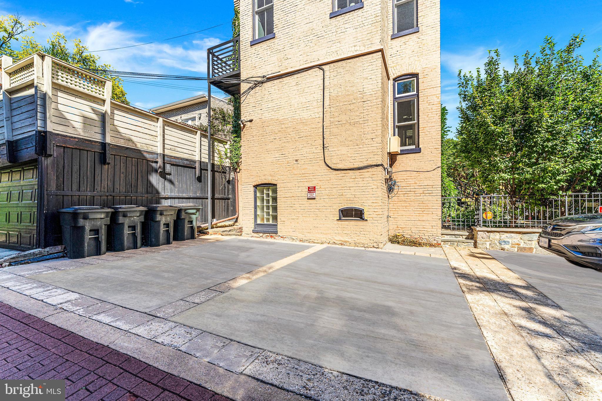 1302 R Street Northwest, Unit 1 Washington, DC 20009 - Photo 32 of 45 Pkg spot on right is assigned&deeded to this unit!