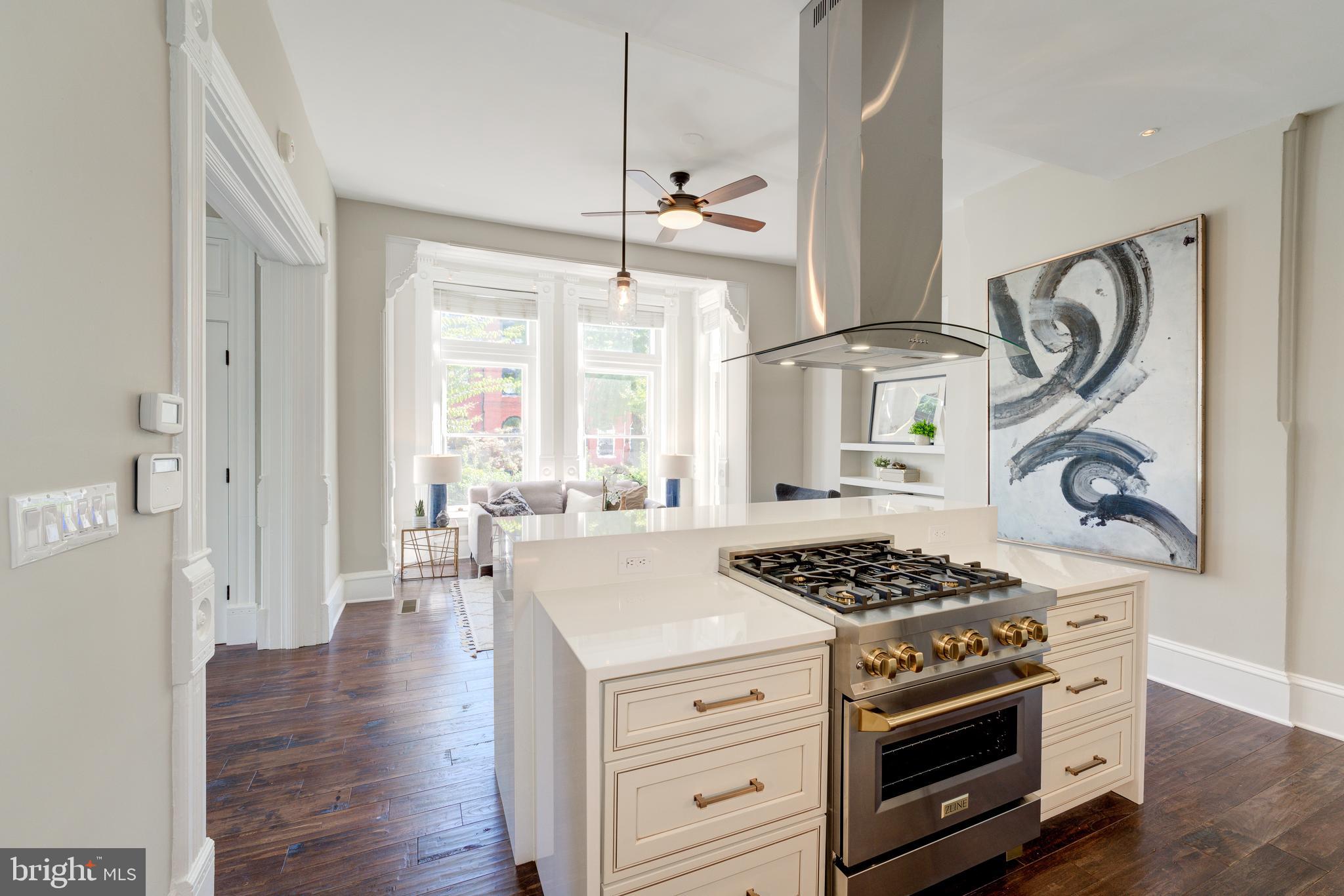 1302 R Street Northwest, Unit 1 Washington, DC 20009 - Photo 9 of 45 Zline SS&brass stove with commercial exhaust fan!