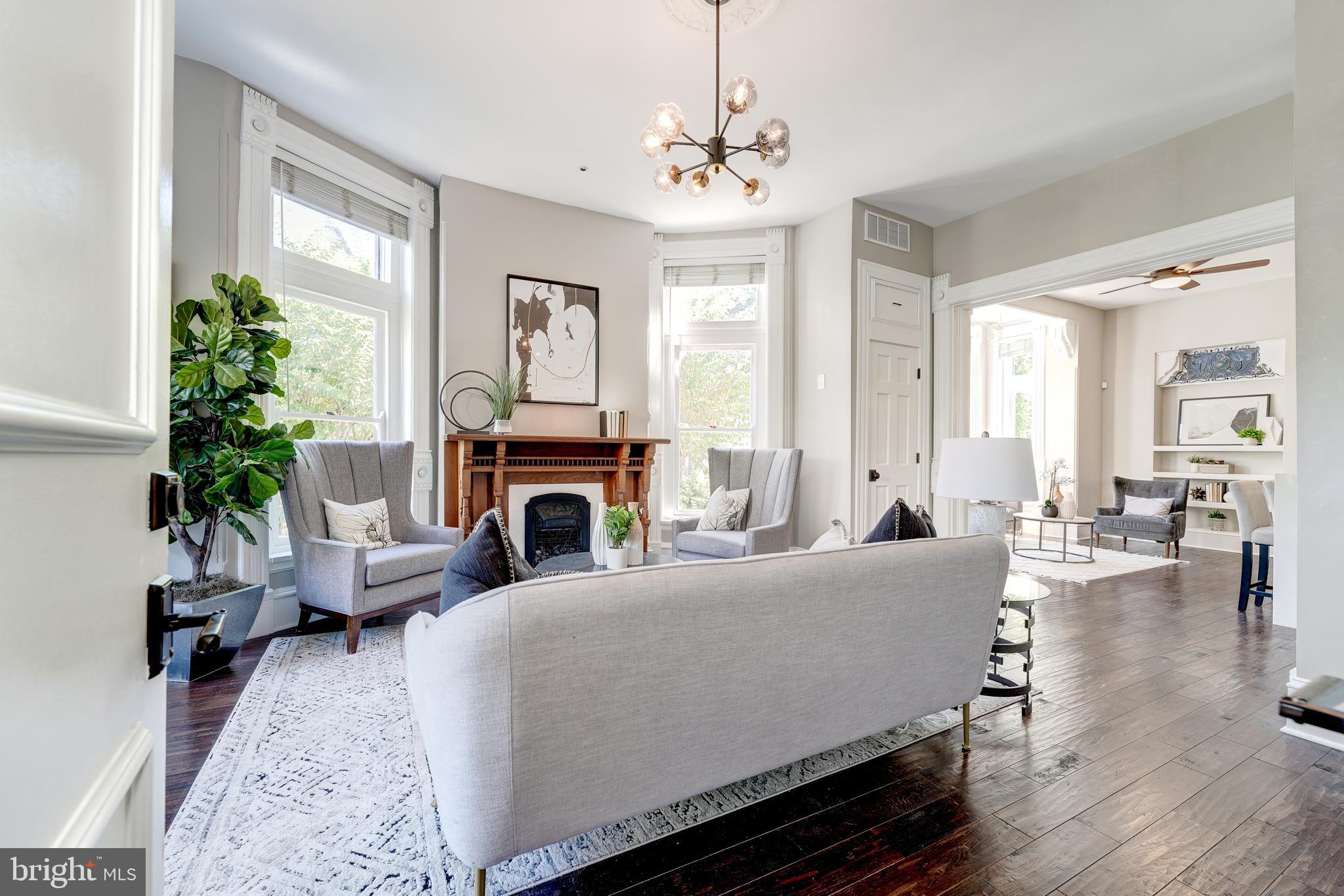 1302 R Street Northwest, Unit 1 Washington, DC 20009 - Photo 10 of 45 12' ceilings & mahogany mantle are exceptional!