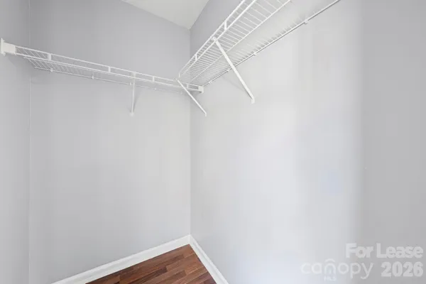 a view of a room with racks on the wall