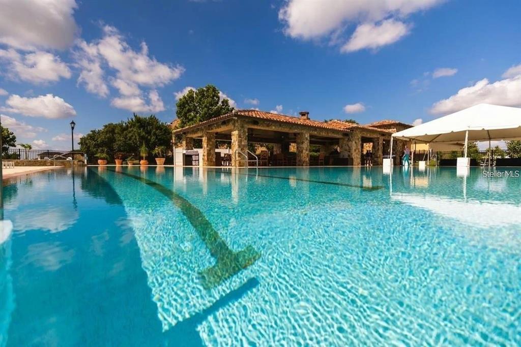 15701 Vetta Drive Montverde, FL 34756 - Photo 16 of 68 a view of a house with a yard