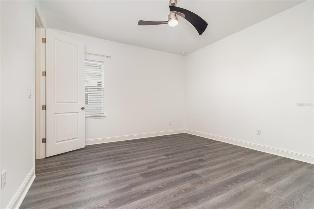 15701 Vetta Drive Montverde, FL 34756 - Photo 38 of 68 wooden floor in an empty room
