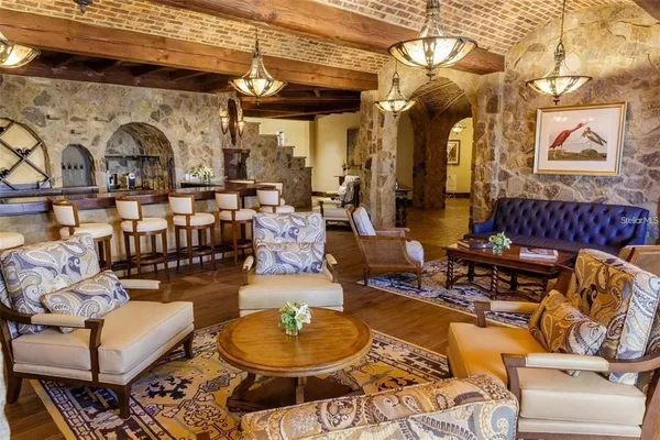 an aerial view of a house with a lake view