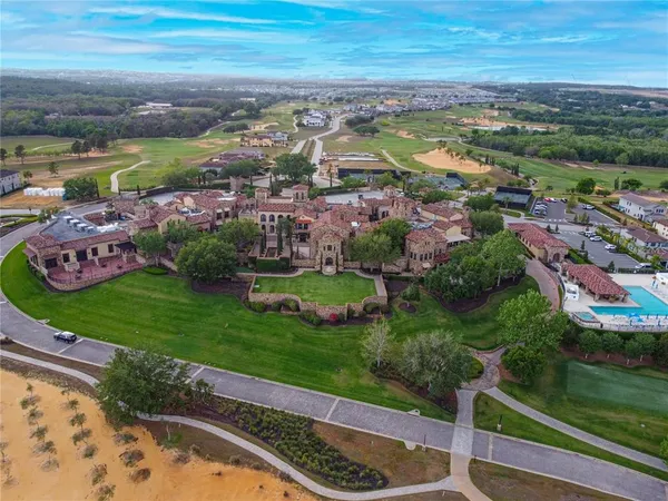 a aerial view of a house with a yard