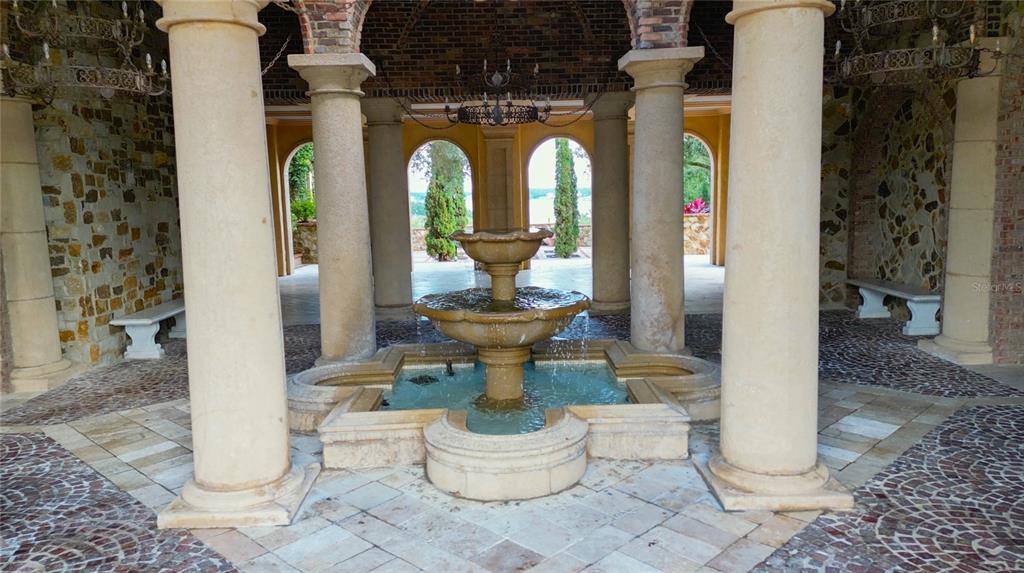 15701 Vetta Drive Montverde, FL 34756 - Photo 57 of 68 a bathroom with a toilet and a shower