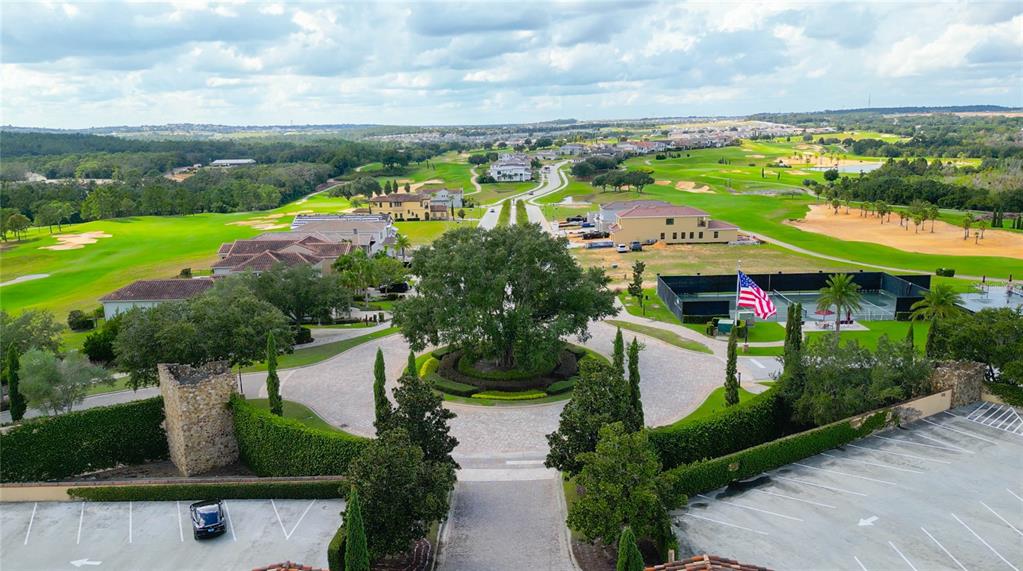 15701 Vetta Drive Montverde, FL 34756 - Photo 67 of 68 an aerial view of residential houses with outdoor space and trees
