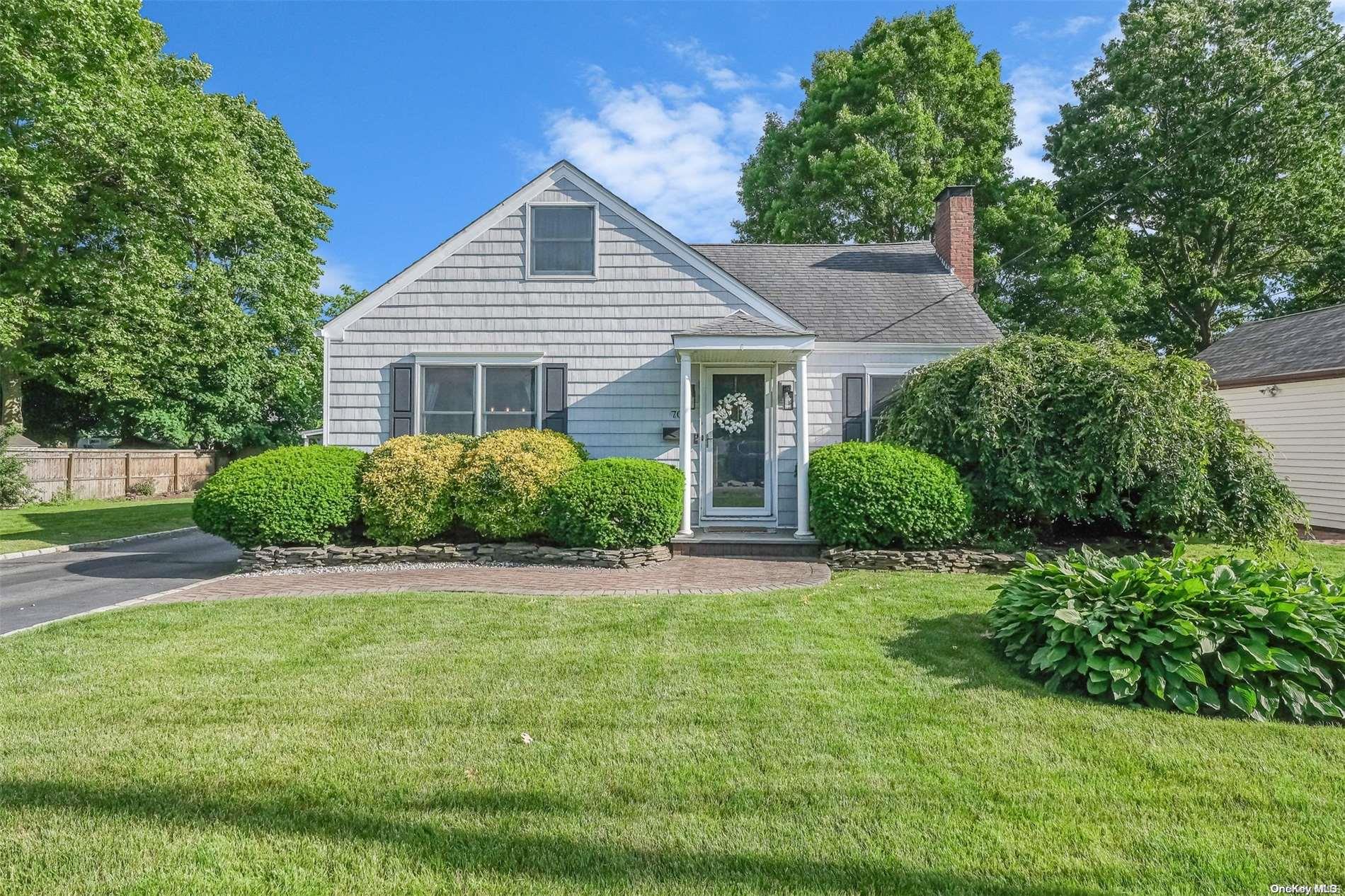 70 Everett Street Patchogue, NY 11772 - Photo 1 of 1 a house that has a lot of plants in it
