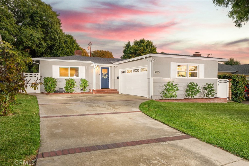 536 North Pennsylvania Avenue Glendora, CA 91741 - Photo 1 of 38 a front view of a house with a yard and potted plants
