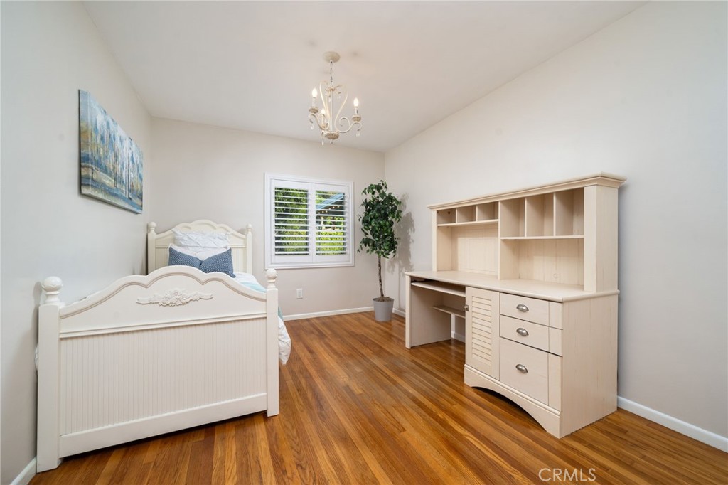 536 North Pennsylvania Avenue Glendora, CA 91741 - Photo 19 of 38 a bedroom with a bed and a dresser