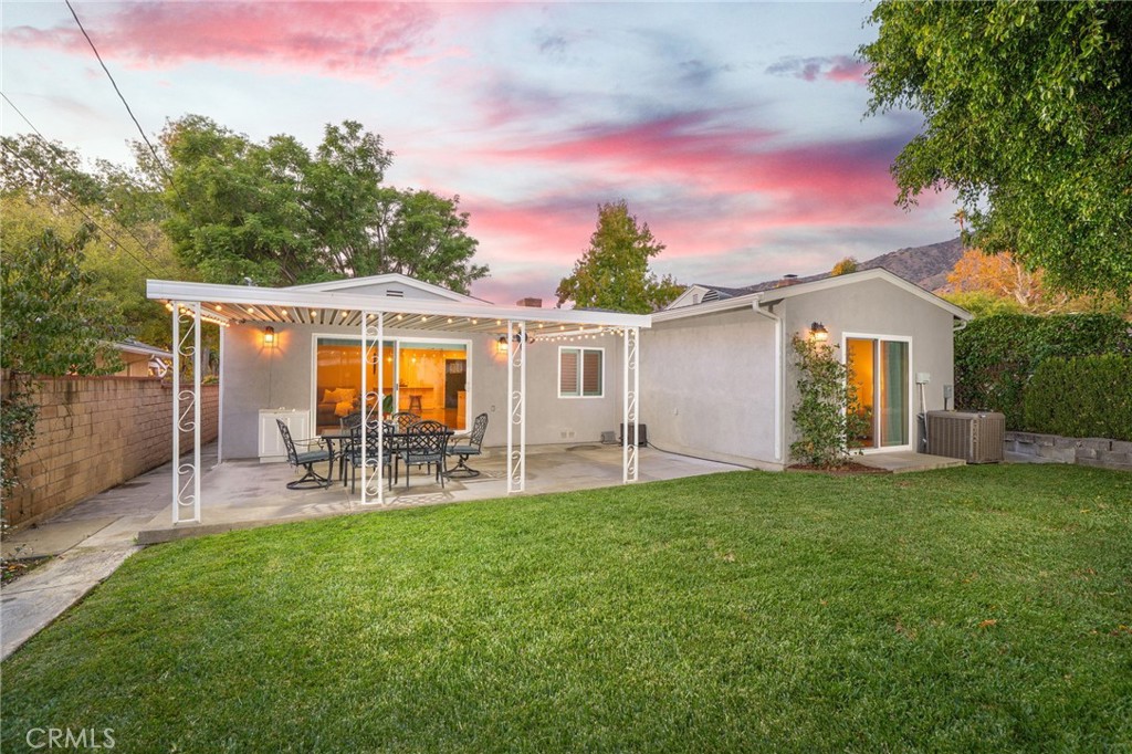 536 North Pennsylvania Avenue Glendora, CA 91741 - Photo 20 of 38 a patio with table and chairs and potted plants