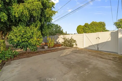 a view of a house with a street