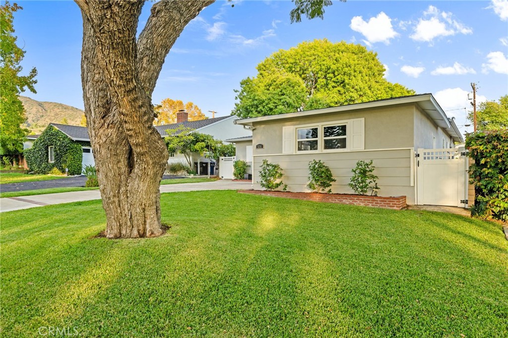 536 North Pennsylvania Avenue Glendora, CA 91741 - Photo 37 of 38 a view of a house with a backyard