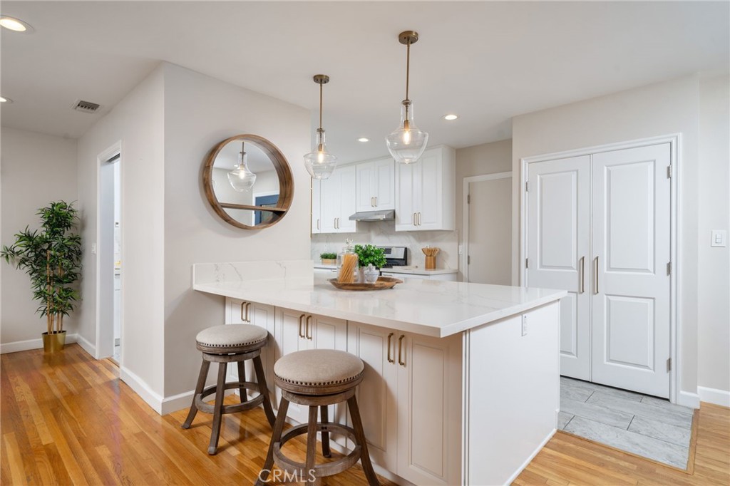 536 North Pennsylvania Avenue Glendora, CA 91741 - Photo 5 of 38 a kitchen with a table and chairs in it
