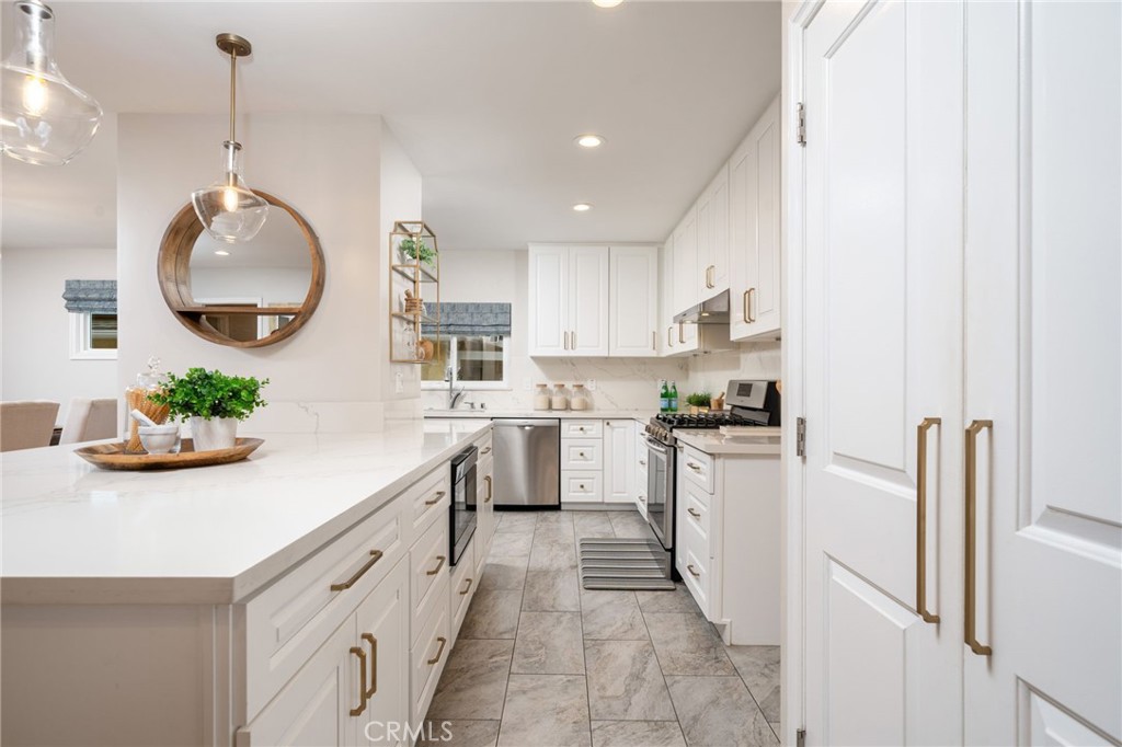 536 North Pennsylvania Avenue Glendora, CA 91741 - Photo 7 of 38 a kitchen with cabinets and window