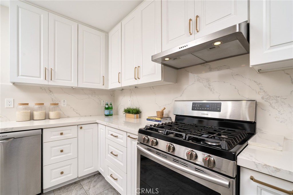 536 North Pennsylvania Avenue Glendora, CA 91741 - Photo 8 of 38 a kitchen with white cabinets and appliances