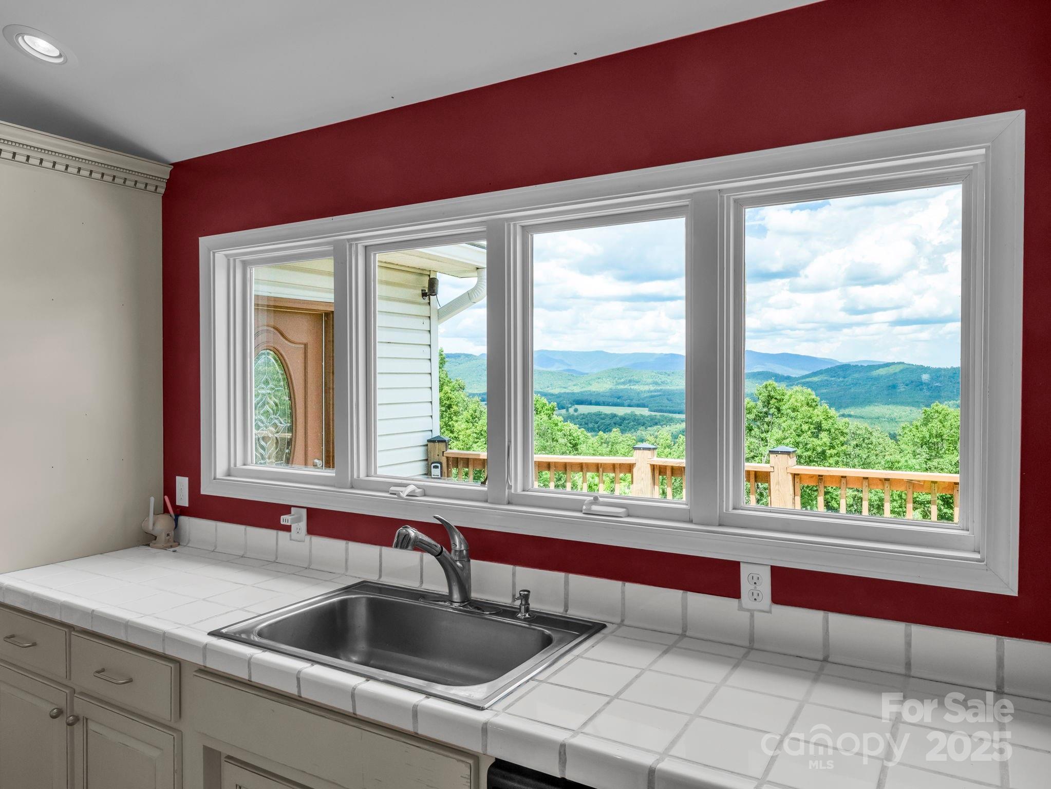 995 Towery Trace Road Ellenboro, NC 28040 - Photo 12 of 47 a kitchen with a sink and large window