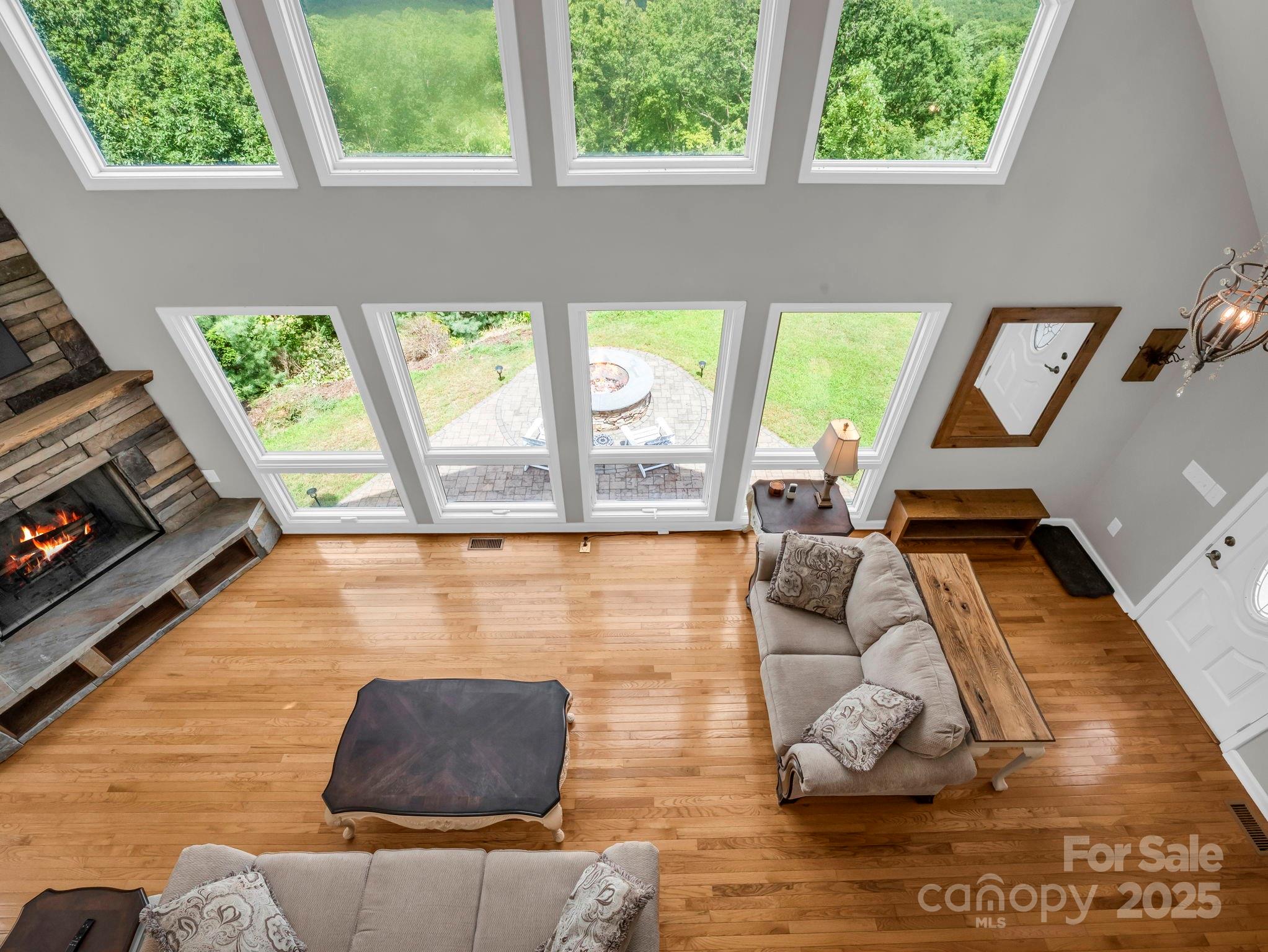 995 Towery Trace Road Ellenboro, NC 28040 - Photo 19 of 47 a living room with furniture and a large window