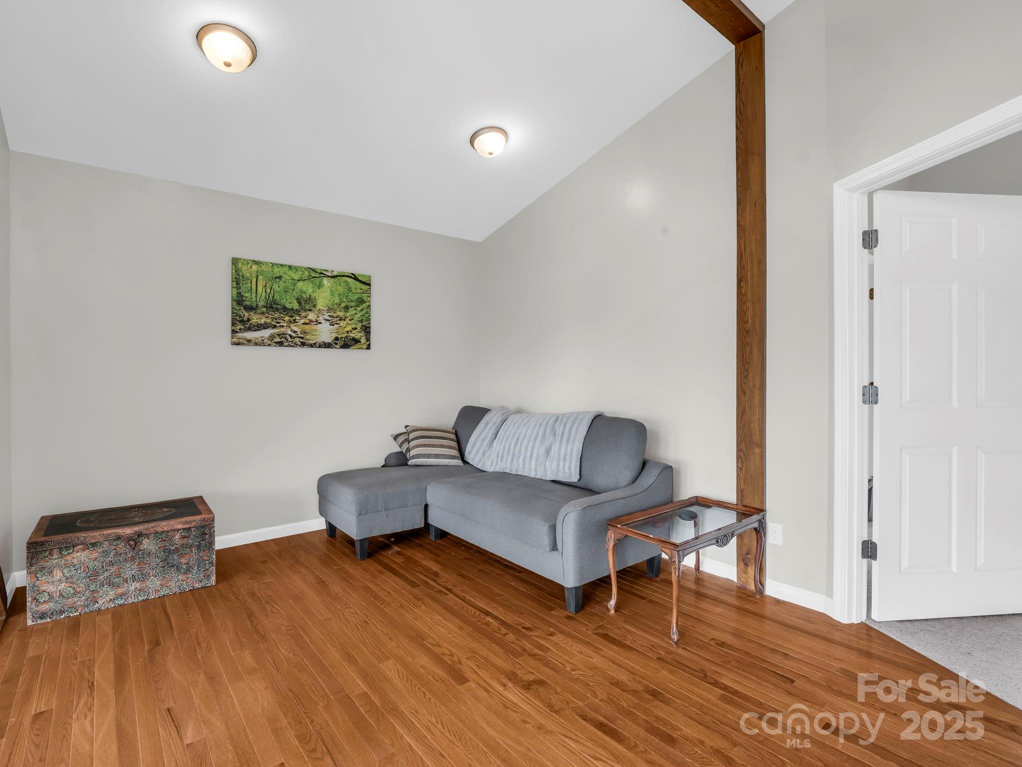 995 Towery Trace Road Ellenboro, NC 28040 - Photo 21 of 47 a living room with furniture and a wooden floor