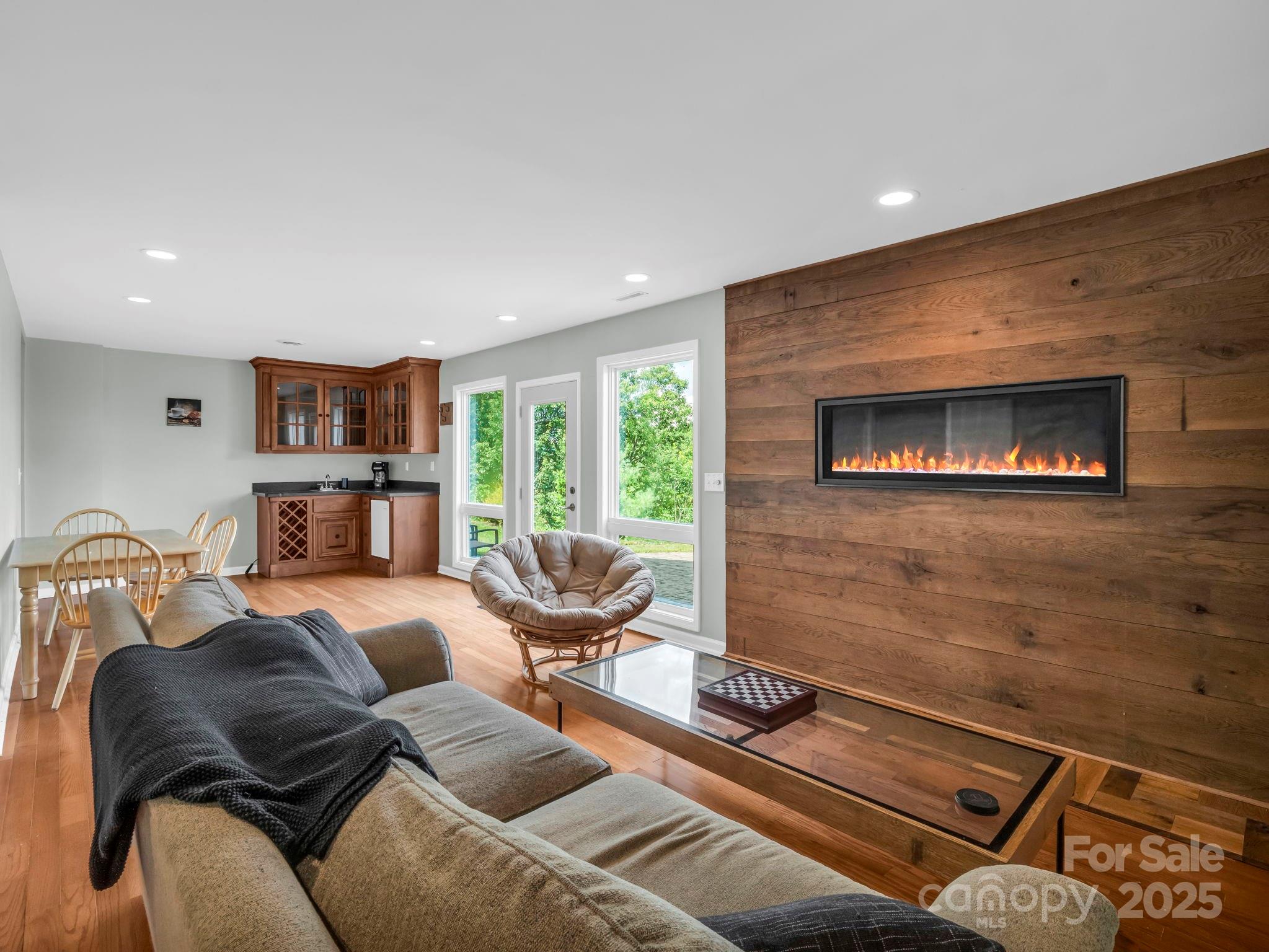 995 Towery Trace Road Ellenboro, NC 28040 - Photo 25 of 47 a living room with furniture and a flat screen tv