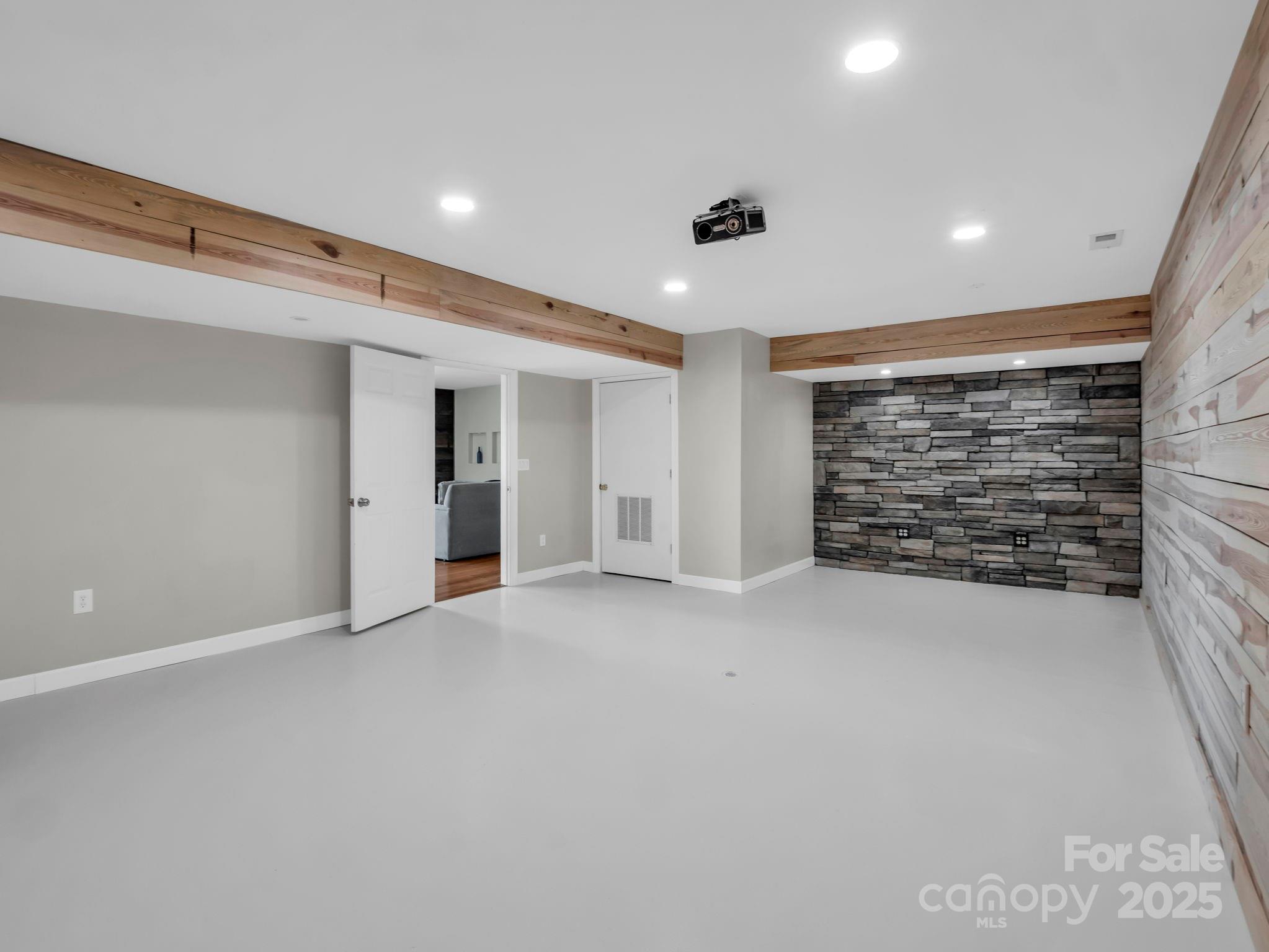 995 Towery Trace Road Ellenboro, NC 28040 - Photo 29 of 47 a view of an empty room with brick wall and closet