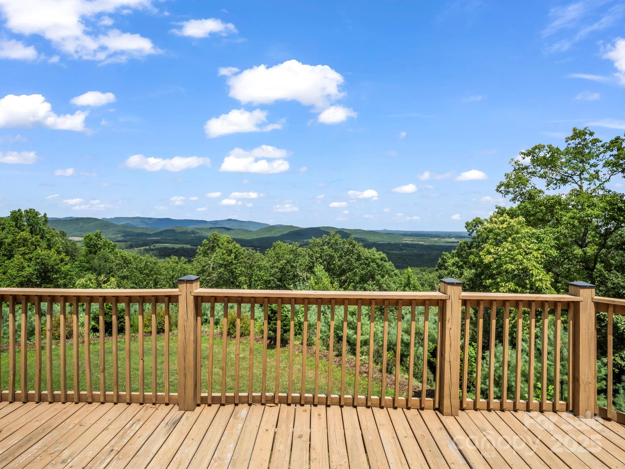 995 Towery Trace Road Ellenboro, NC 28040 - Photo 3 of 47 a view of a wooden roof deck