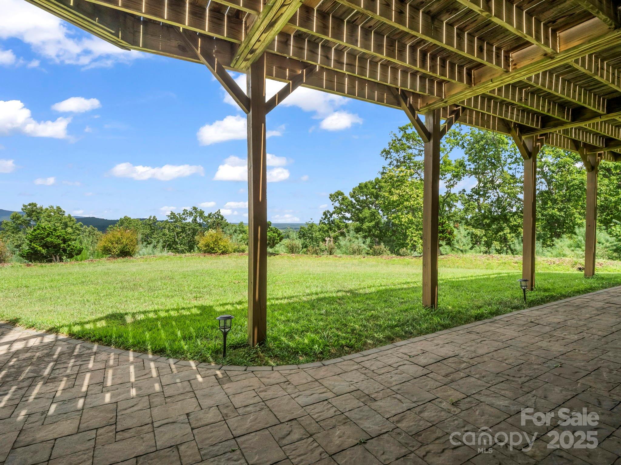 995 Towery Trace Road Ellenboro, NC 28040 - Photo 39 of 47 a view of a backyard with pathway