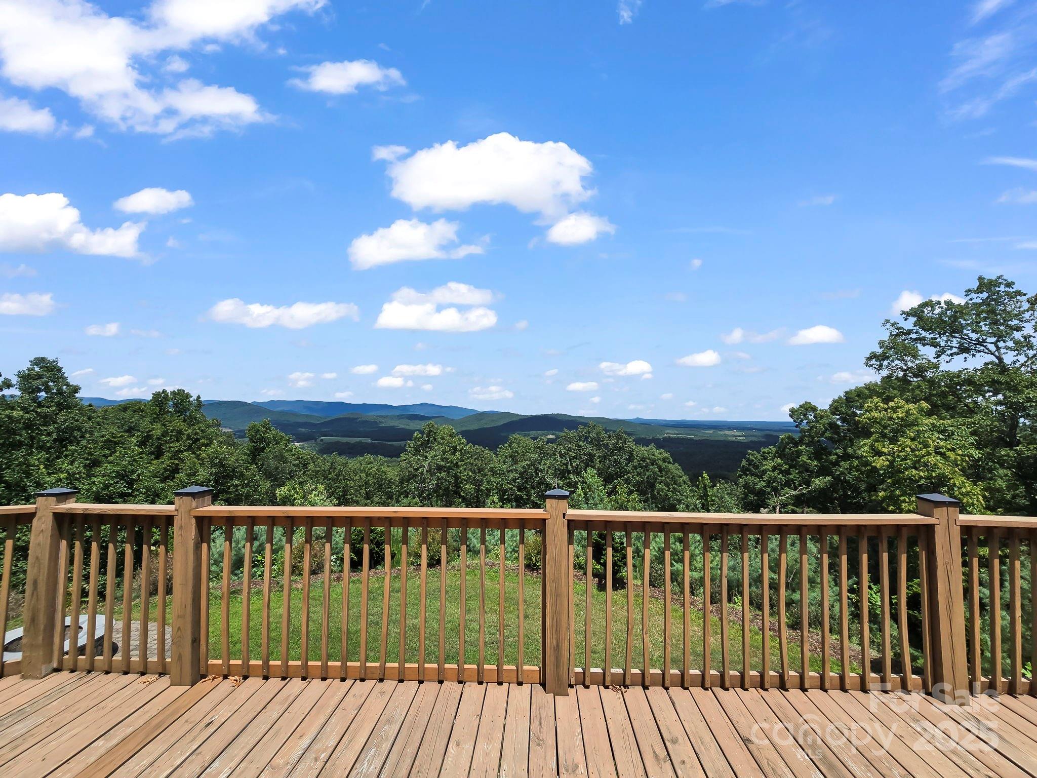 995 Towery Trace Road Ellenboro, NC 28040 - Photo 41 of 47 a balcony with wooden floor and city view