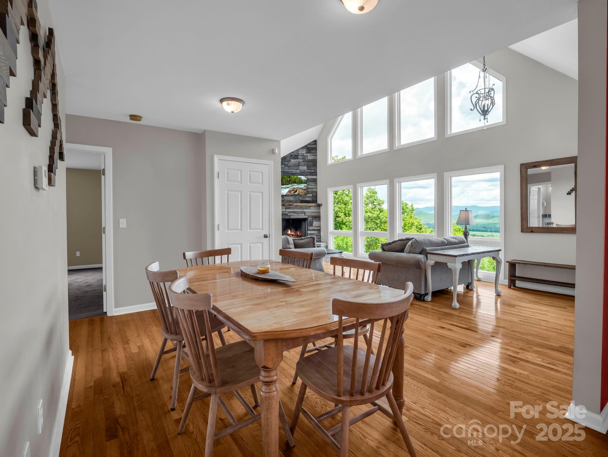 995 Towery Trace Road Ellenboro, NC 28040 - Photo 7 of 47 a view of a dining room with furniture and wooden floor