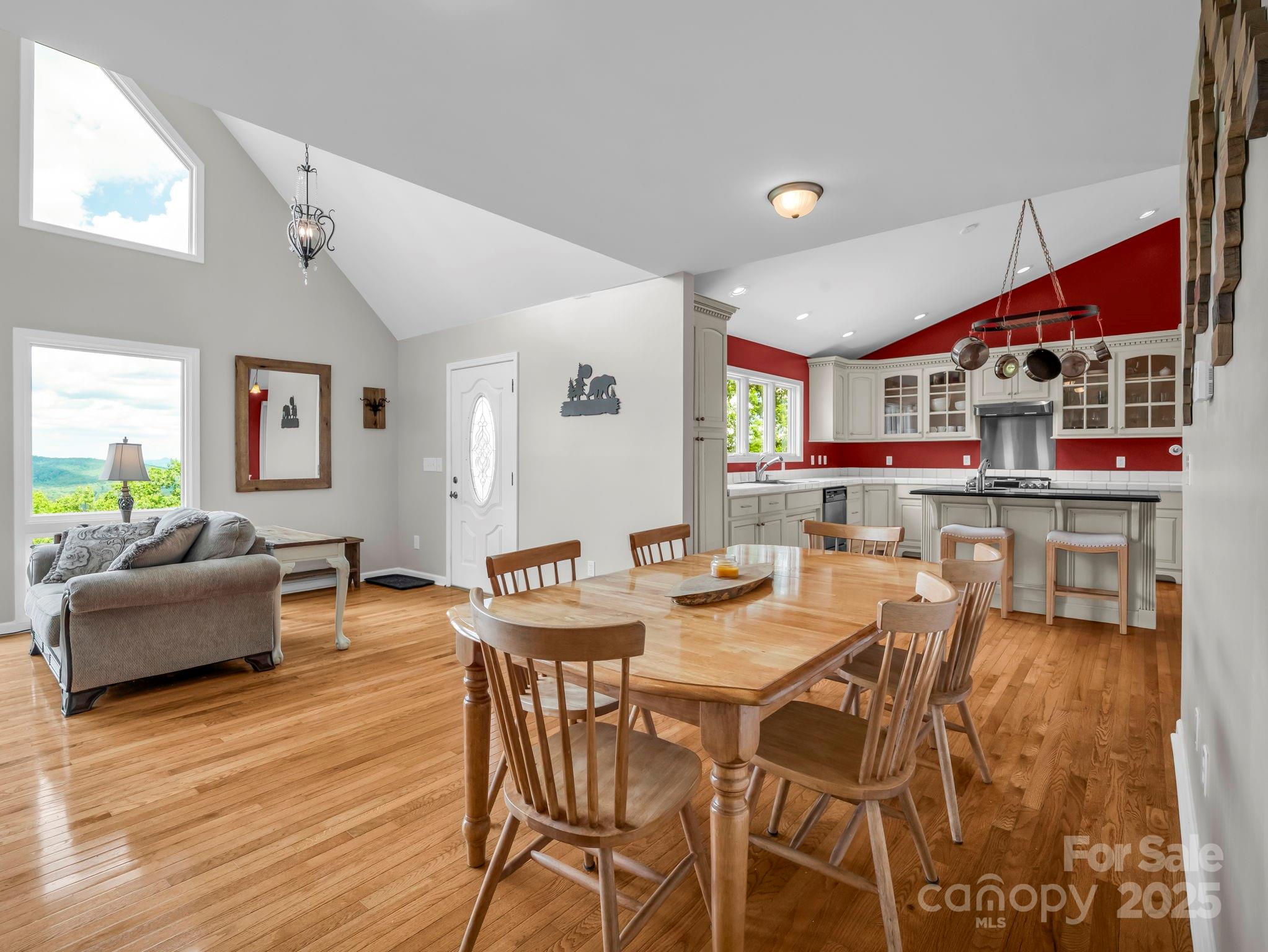 995 Towery Trace Road Ellenboro, NC 28040 - Photo 8 of 47 a view of a dining room with furniture and wooden floor