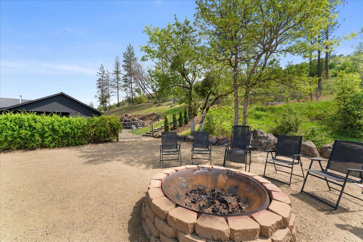 2220 Butte Falls Highway Eagle Point, OR 97524 - Photo 53 of 69 a view of a backyard with sitting area