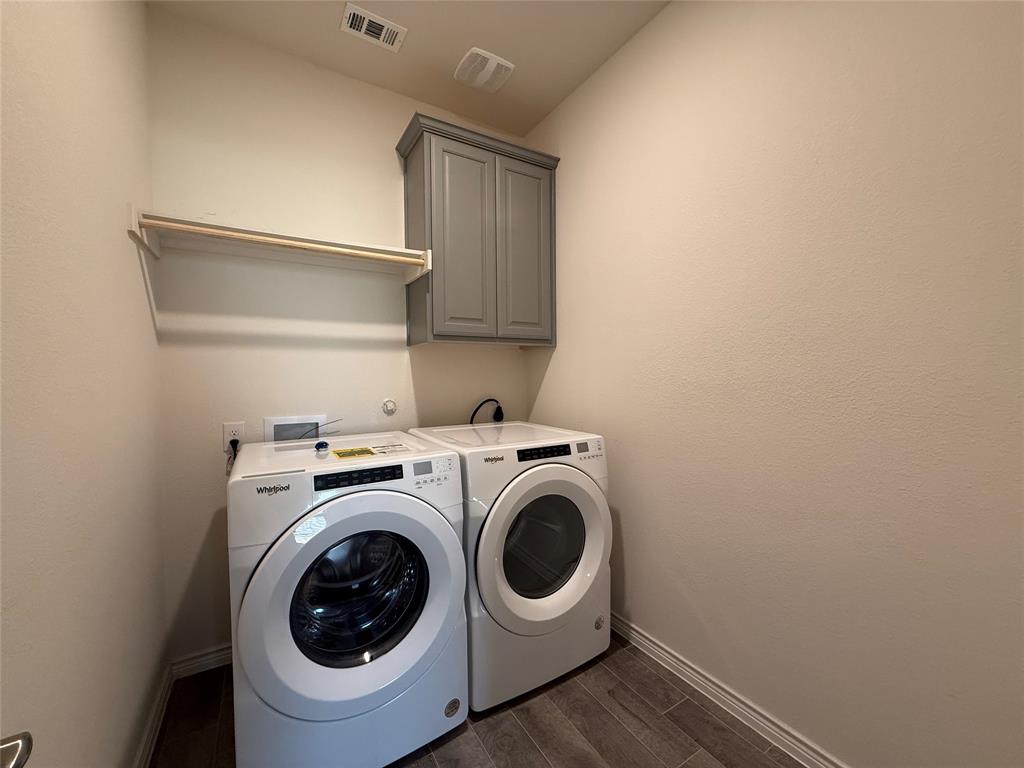 4124 Ellinger Drive Forney, TX 75126 - Photo 26 of 28 a utility room with dryer and washer