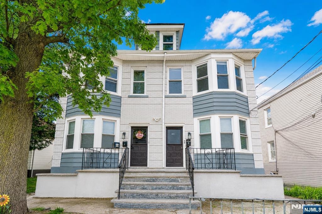 183 Bergen Turnpike Ridgefield Park, NJ 07660 - Photo 2 of 18 a front view of a house