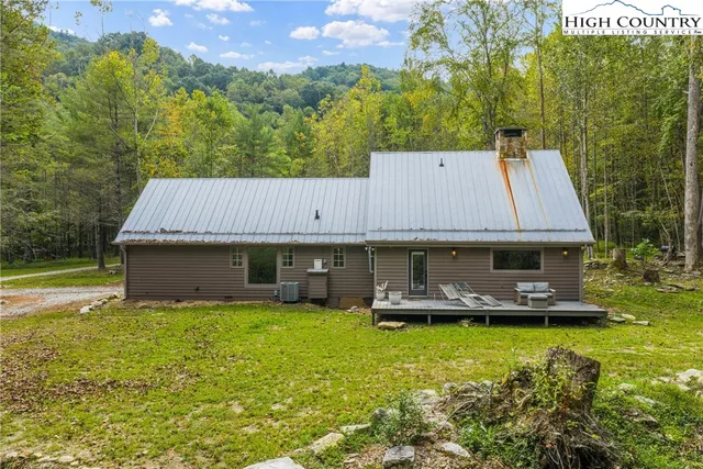 a view of a house with a garden