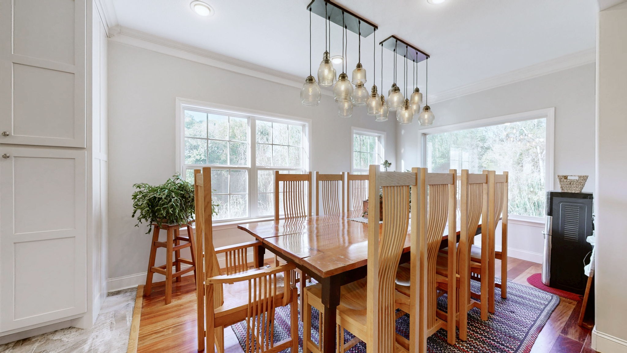 3400 Cobblestone Mills Road Spring Hill, TN 37174 - Photo 11 of 63 a view of a dining room with furniture and chandelier