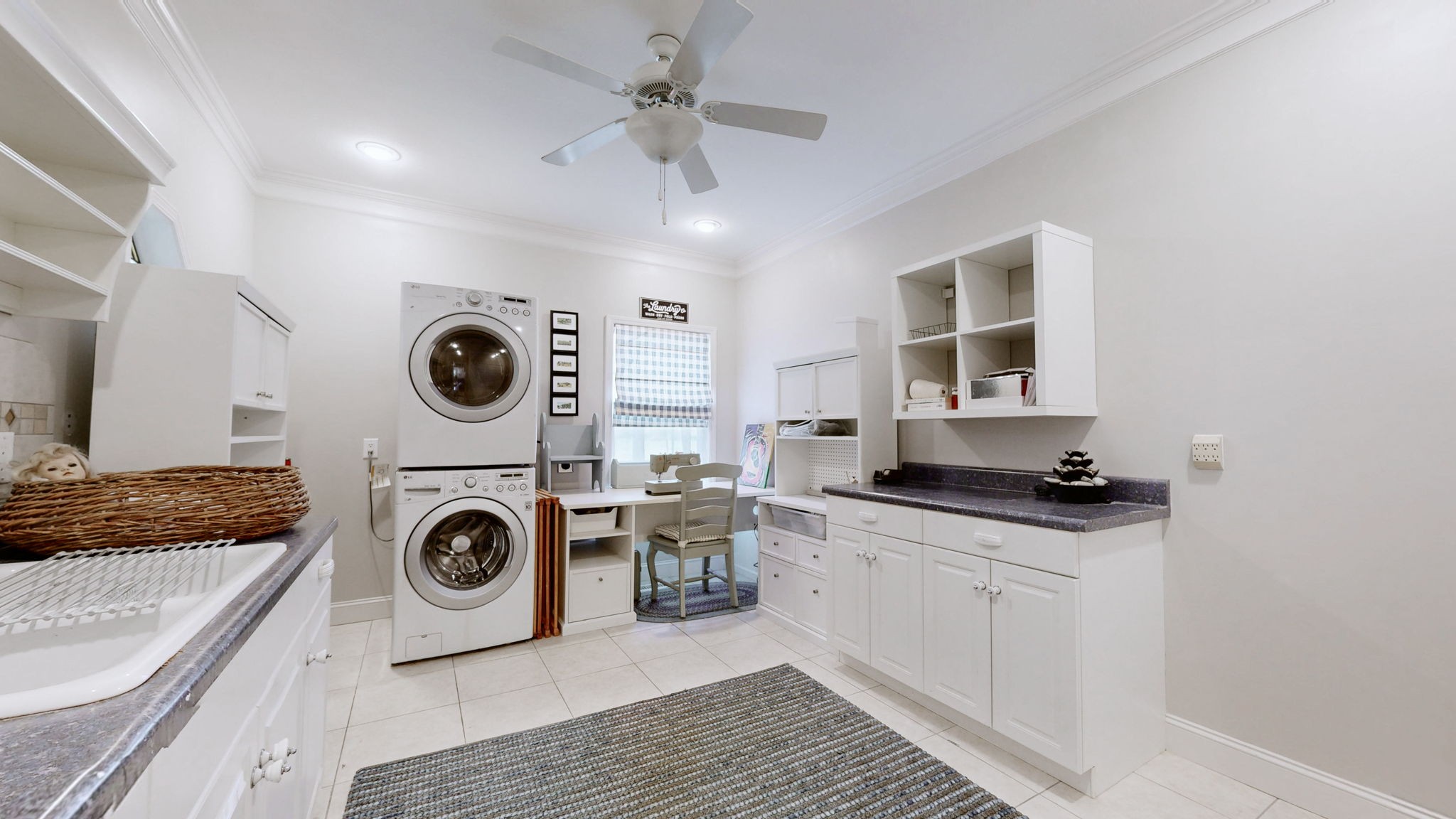 3400 Cobblestone Mills Road Spring Hill, TN 37174 - Photo 22 of 63 a kitchen with granite countertop a sink a stove and washer