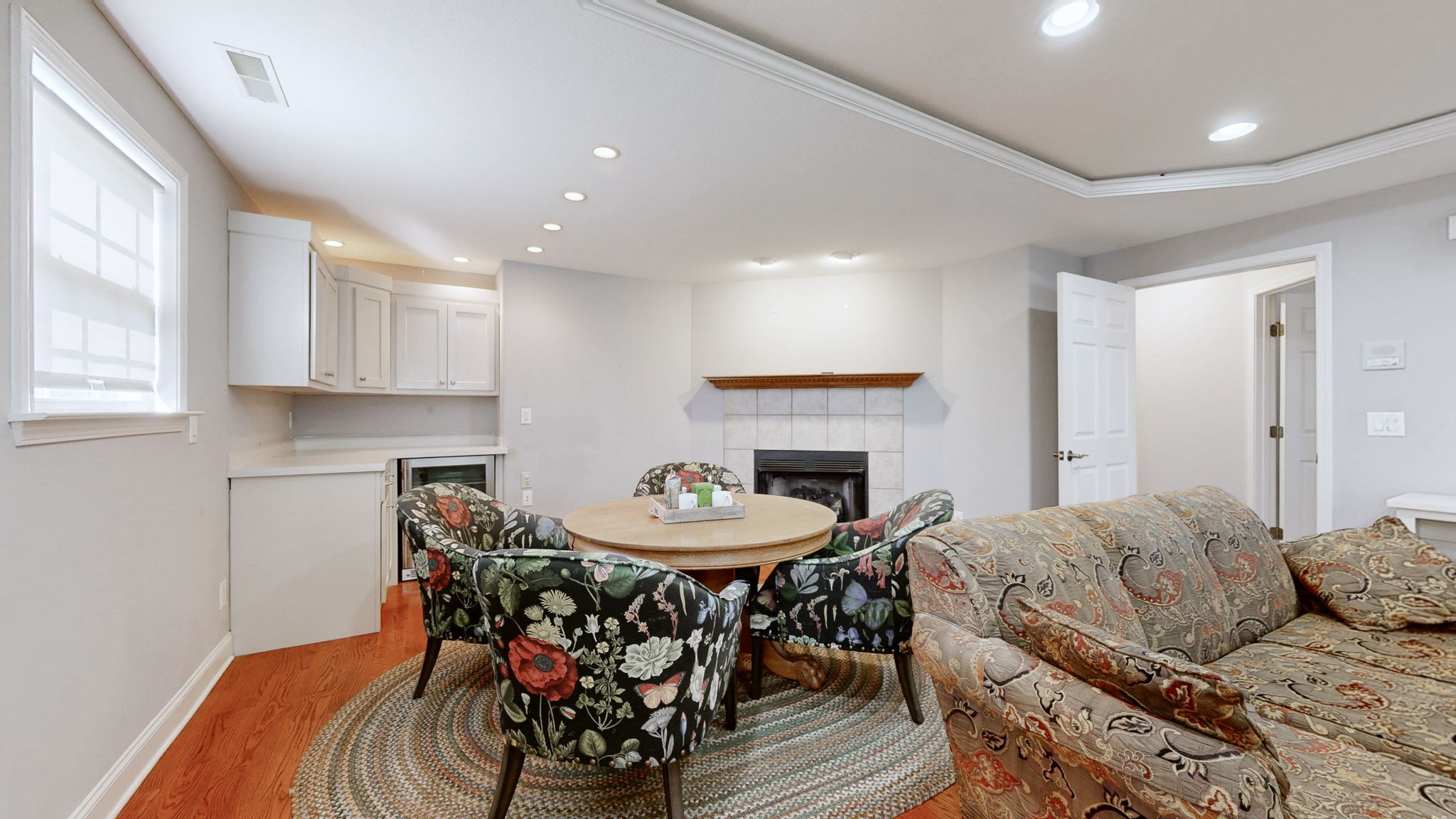 3400 Cobblestone Mills Road Spring Hill, TN 37174 - Photo 25 of 63 a view of a a dining room with furniture window and wooden floor