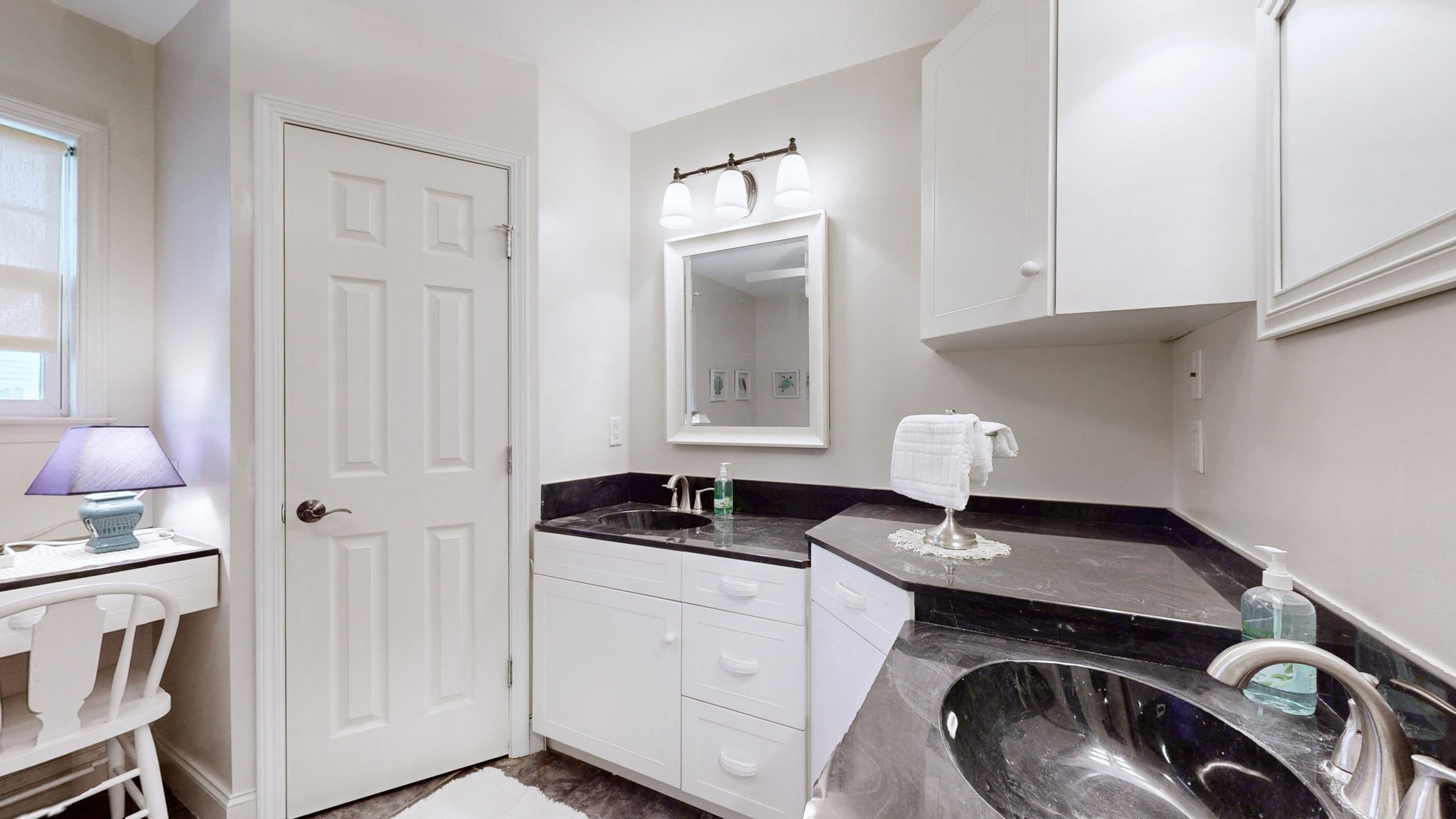 3400 Cobblestone Mills Road Spring Hill, TN 37174 - Photo 28 of 63 a close view of a sink a washer and dryer