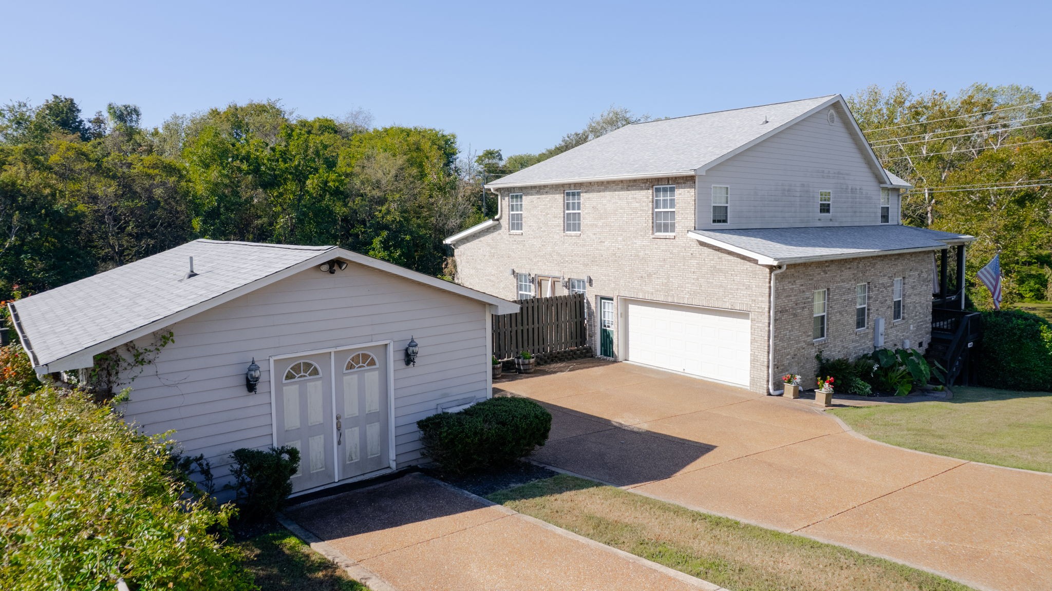 3400 Cobblestone Mills Road Spring Hill, TN 37174 - Photo 3 of 63 a view of a house with a yard and plants