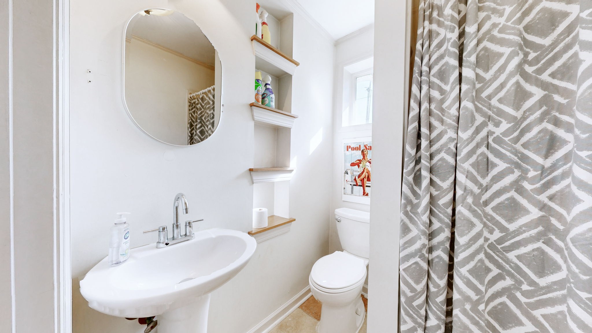 3400 Cobblestone Mills Road Spring Hill, TN 37174 - Photo 39 of 63 a bathroom with a sink and a mirror