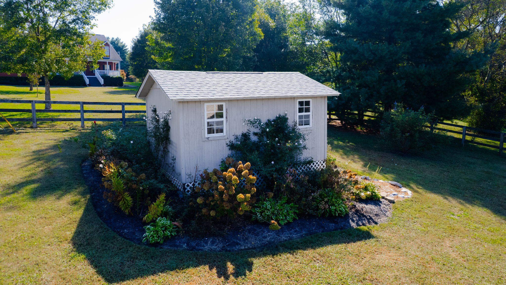 3400 Cobblestone Mills Road Spring Hill, TN 37174 - Photo 53 of 63 a view of a house with a yard and garden